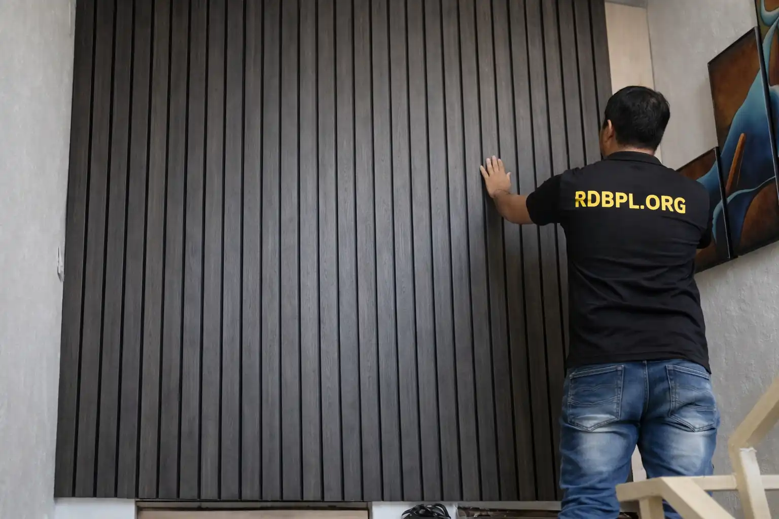 Charcoal PVC wall panel installation service in Lucknow for accent walls