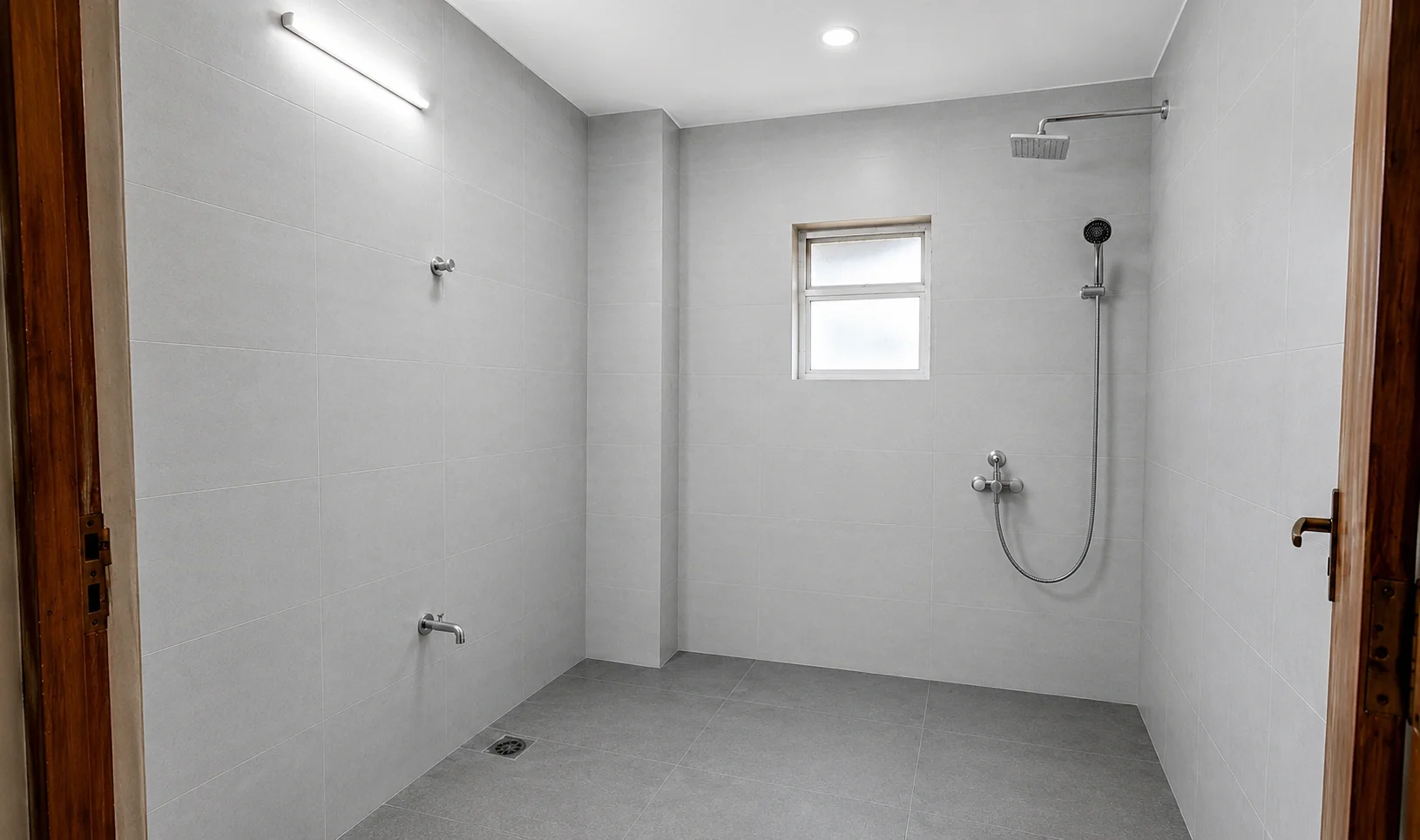 Bathroom after tiles flooring work in Lucknow