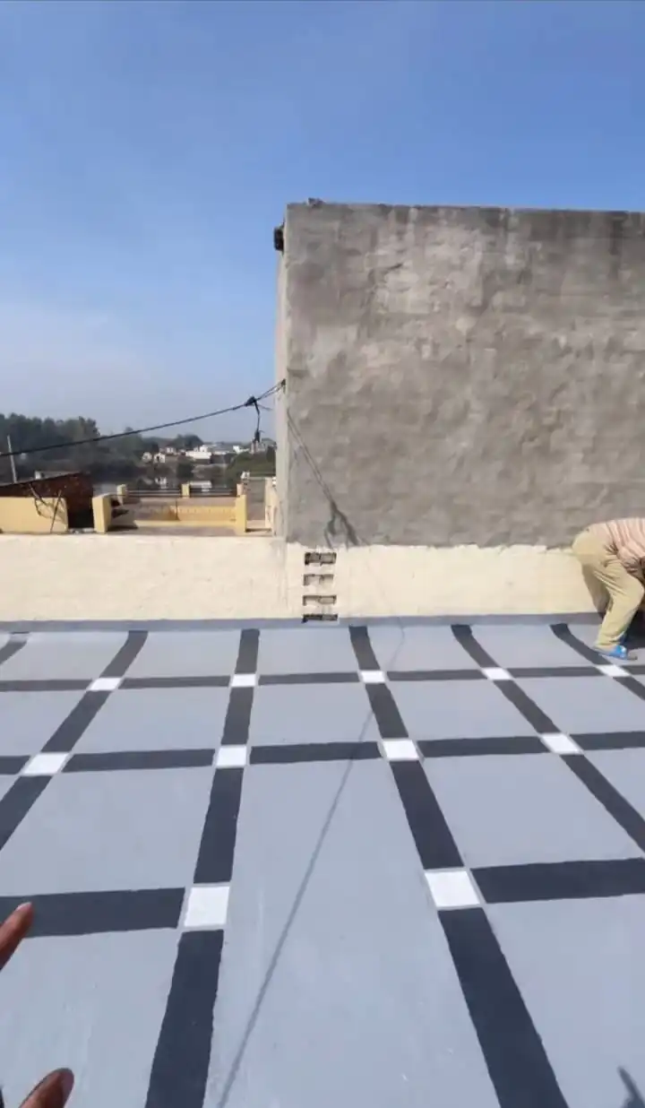 Roof surface preparation work before waterproof coating in Lucknow